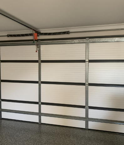 Energy Efficiency and Comfort Gains from Insulsqueeze garage Door Insulation